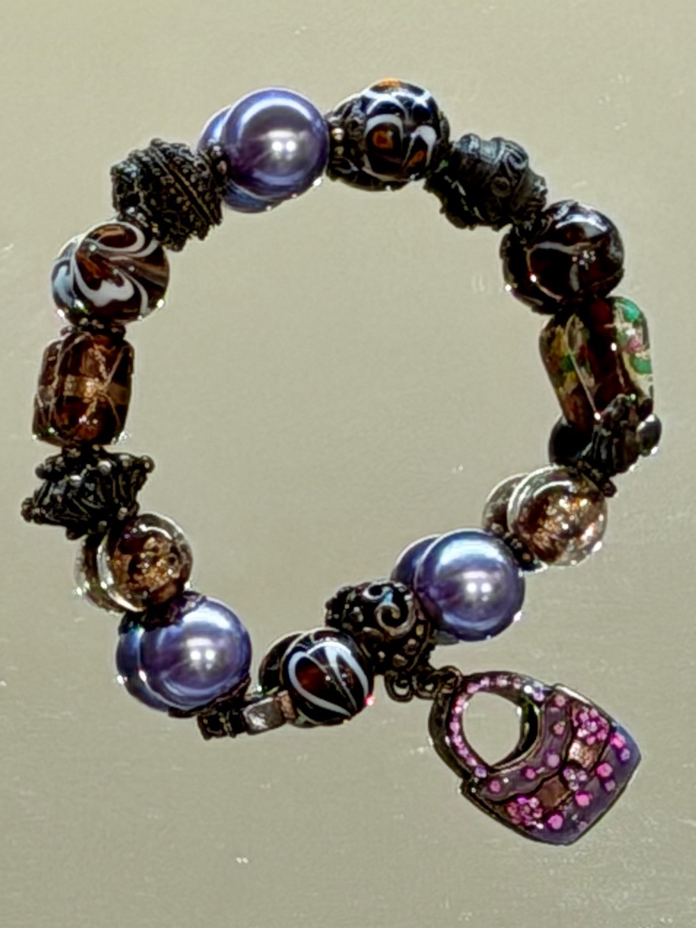 Handmade Purple Beaded Charm Bracelet with Pink Purse Charm